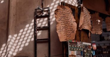 Brown concrete building under blue sky during daytime Image